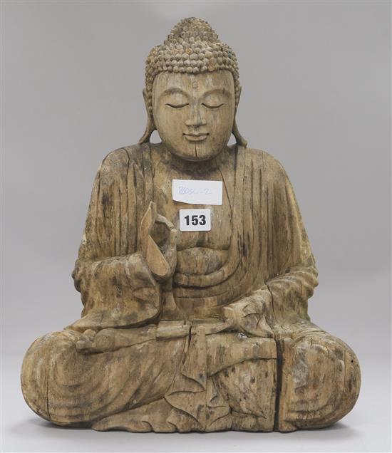 An Asian carved wood Buddha height 41.5cm